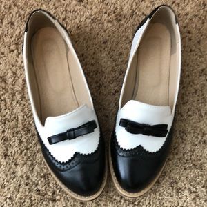 Black and white saddle shoes